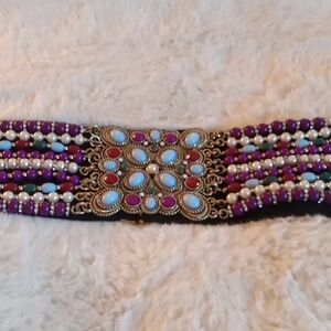 Black elastic beaded belt 48" long or 28" doubled (see video) gold tone hardware